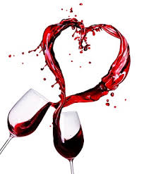 Chocolate Crazy Cake Wine-two wine glasses clicking together making the spilled wine look like a heart